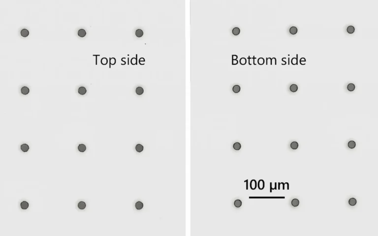 Bottom-up milling of 100 µm diameter taper-free channels in glass