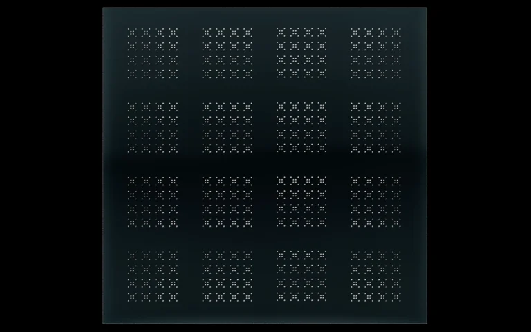 Selective laser etching (SLE) of through-glass vias in glass.